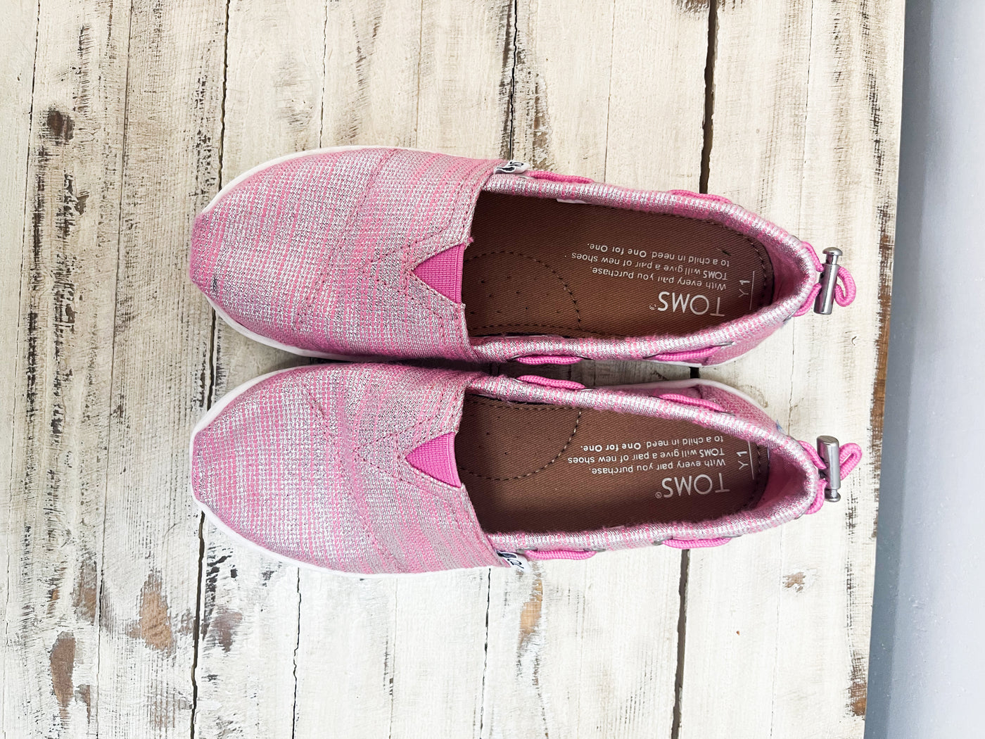 Kids TOMS pink shoes